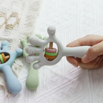 Soft Baby Silicone Teething Rattle Toys bentuk tangan telapak tangan: Bebas BPA, Tidak beracun, dapat dikunyah