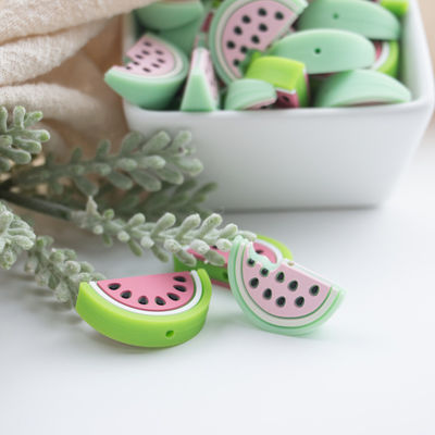 kualitas  Red Watermelon Shaped Silicone Beads Soft For Baby Teething pabrik