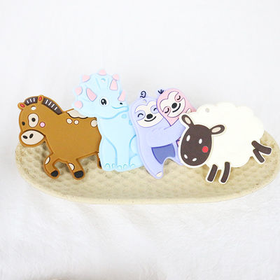 Baby Teether Silikon Pribadi Berwarna-warni Dengan Bentuk Dino Kuda Domba