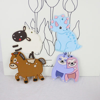 Baby Teether Silikon Pribadi Berwarna-warni Dengan Bentuk Dino Kuda Domba