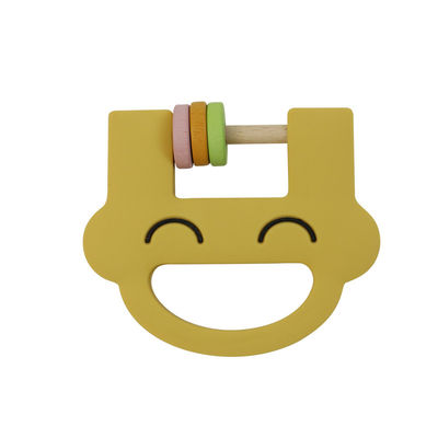 Smile Face Cute Silicone Kids Toys Silicone Rattle Teether Dengan Logo Kustomisasi OEM ODM