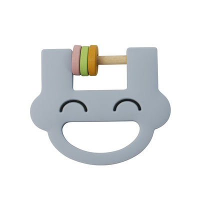 Smile Face Cute Silicone Kids Toys Silicone Rattle Teether Dengan Logo Kustomisasi OEM ODM