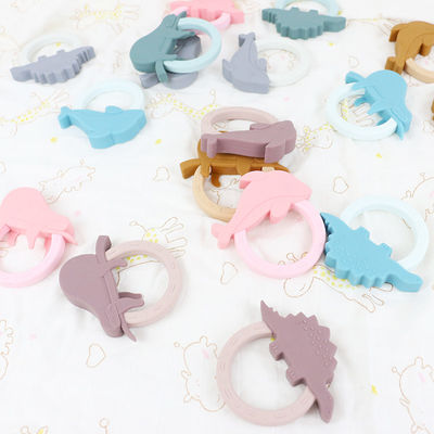 Teether bayi silikon berwarna-warni dengan bentuk penguin hewan kartun