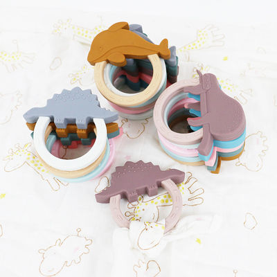 Teether bayi silikon berwarna-warni dengan bentuk penguin hewan kartun