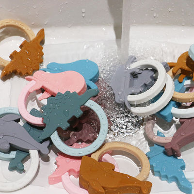 Kartun Silicone Baby Teether Mainan Dengan Bentuk Penguin Unicorn Raccoon