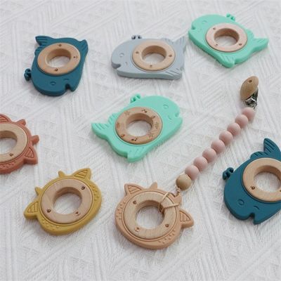 Multifunctional Silicone Baby Teether Dengan Teething Tempel Kayu Ring Animal Pattern