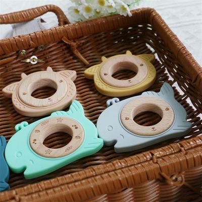 BPA Bebas silikon Baby Teether Dengan Kayu Ring Teething Relief Untuk Bayi awet