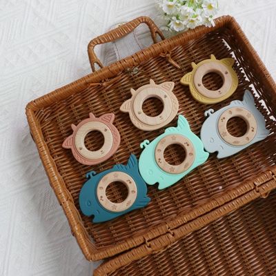 BPA Bebas silikon Baby Teether Dengan Kayu Ring Teething Relief Untuk Bayi awet