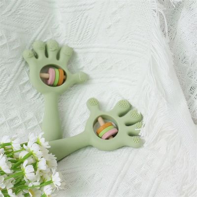 ODM Bayi Mainan Silikon Kelompok Usia Bayi Anak-anak Anak-anak Rattle Bentuk Tangan