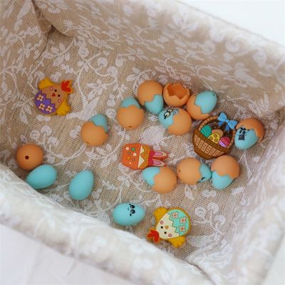 Manik-manik Gigi Silikon Dengan Desain Cetak Custom Silikon 3D Telur Paskah Dengan Shell Focals
